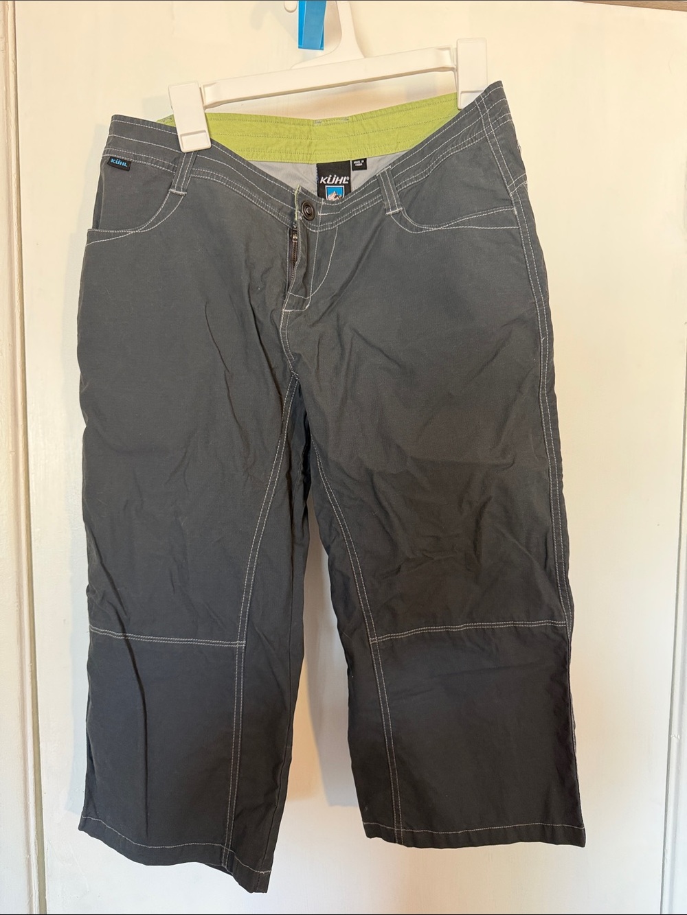 Women’s Gray Outdoor Capri Pants with floral print on back waistband.